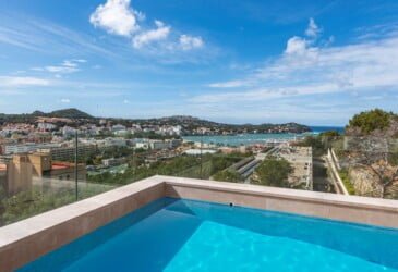 a pool on a rooftop overlooking bay of Santa Ponsa